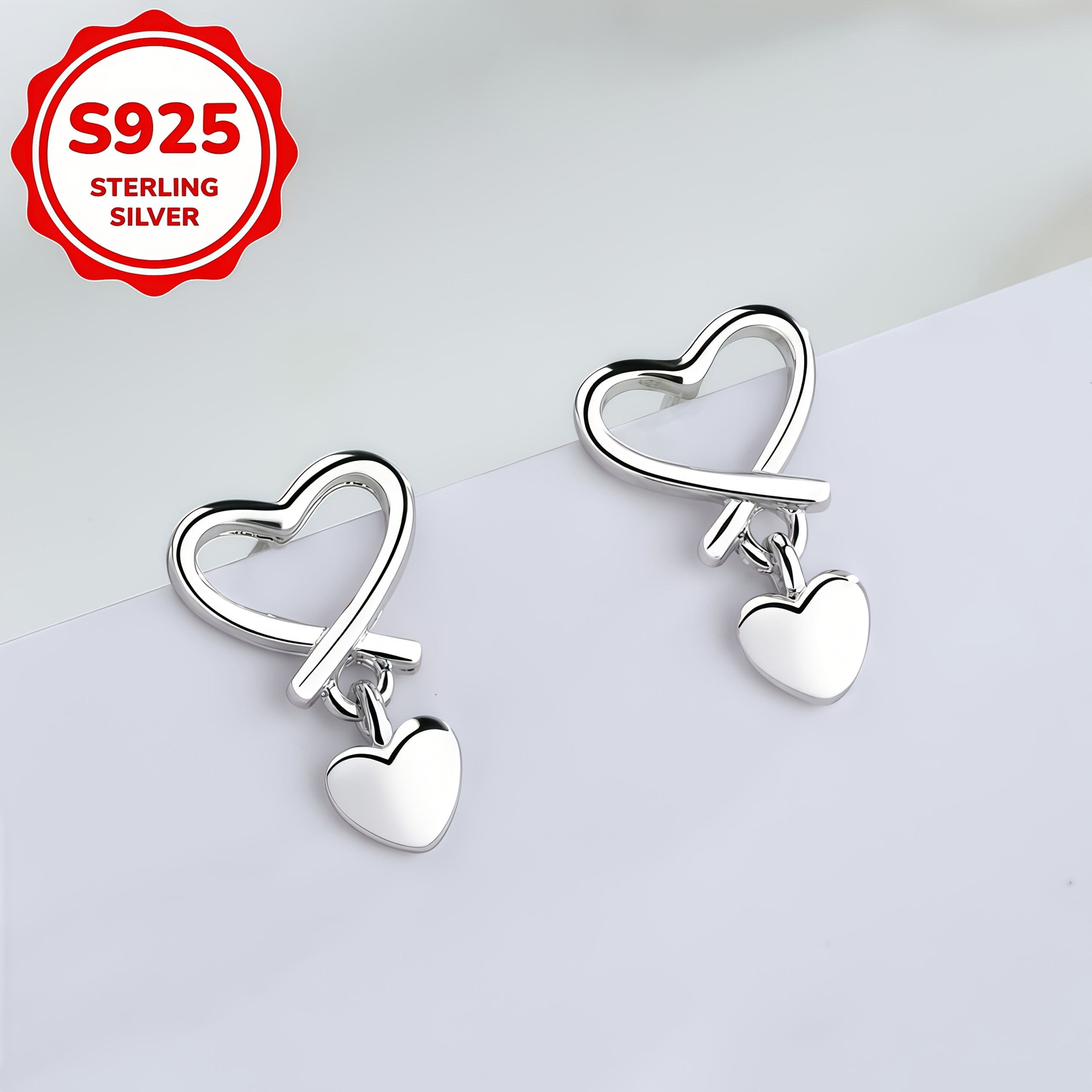 Women's S925 Silver Hollow-Out Heart Stud Earrings